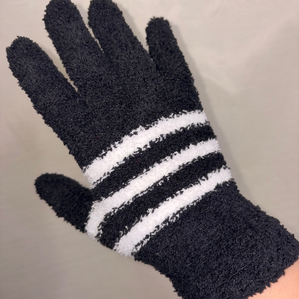 Black and white striped fuzzy warm gloves perfect for cold weather